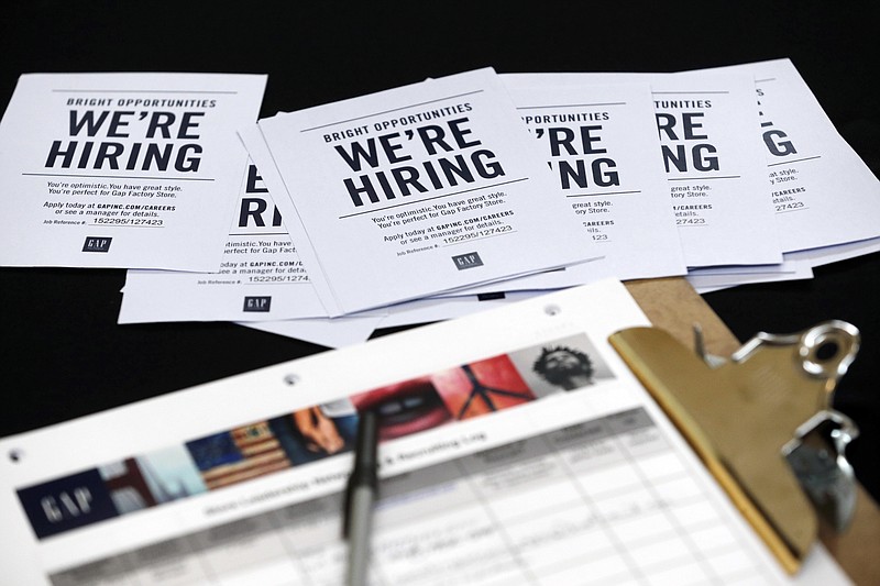 
              FILE - In this Tuesday, Oct. 6, 2015, file photo, job applications and information for the Gap Factory Store sit on a table during a job fair at Dolphin Mall in Miami.  On Thursday, March 30, 2017, the Labor Department says weekly applications for unemployment aid dropped 3,000 to a seasonally adjusted 258,000. The four-week average, a less volatile measure, rose to 254,250.(AP Photo/Wilfredo Lee, File)
            