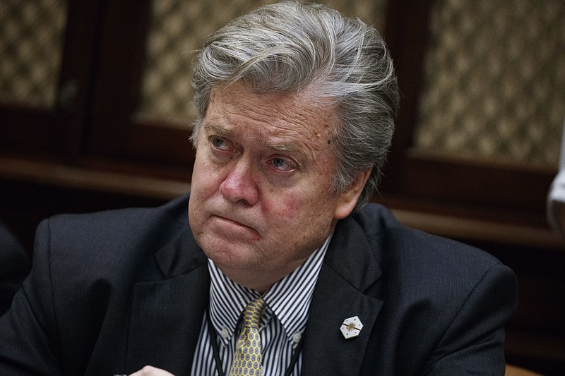 
              FILE - In this Feb. 7, 2017 file photo, White House chief strategist Steve Bannon is seen in the Roosevelt Room of the White House in Washington. The White House on March 31, was set to release financial disclosure forms for more than 100 of it's top administration officials. Bannon, disclosed assets between $13 million and $56 million, including his influential political consultancy, Bannon Strategic Advisors Inc., worth as much as $25 million. Bannon also disclosed that he earned slightly less than $200,000 last year as executive director of Breitbart News Network LLC, before he resigned to join Trump’s campaign last August.(AP Photo/Evan Vucci, File)
            