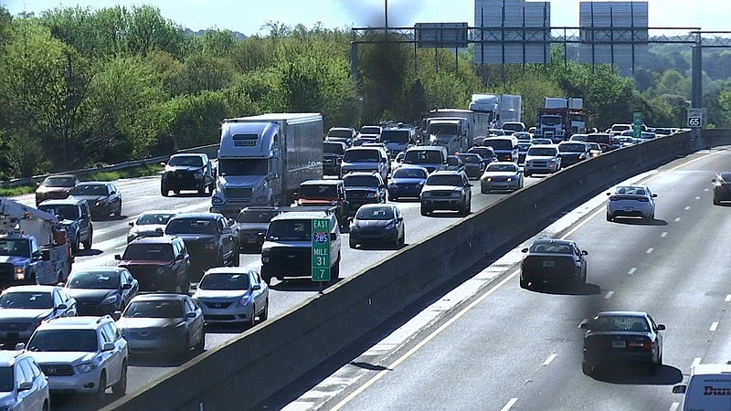 Traffic is bumper to bumper as people scrambled to find alternate routes on Friday, March 31, 2017. Many commuters in some of Atlanta's densely populated northern suburbs will have to find alternate routes or ride public transit for the foreseeable future after a massive fire caused a bridge on Interstate 85 to collapse Thursday, completely shutting down the heavily traveled highway. (AP Photo/Alex Sanz)