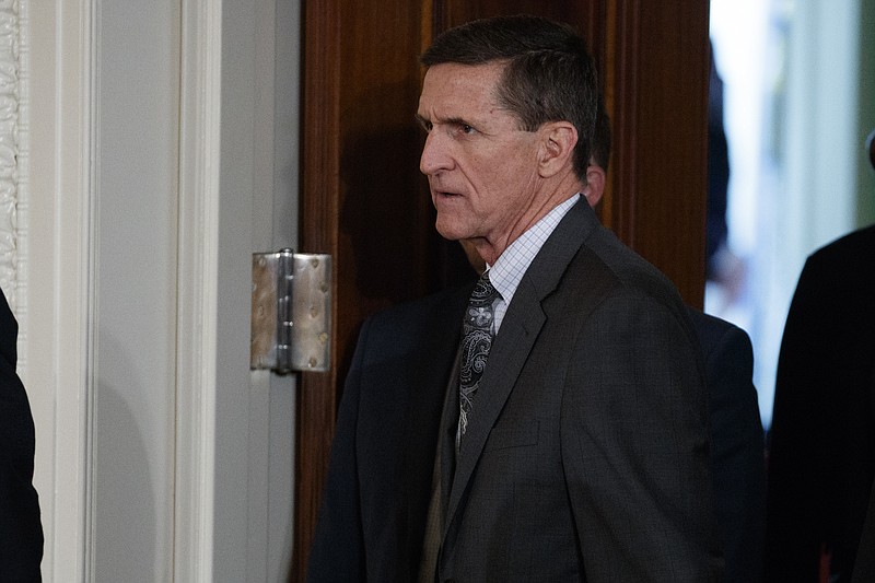 
              FILE - In this Feb. 13, 2017 file photo, Mike Flynn arrives for a news conference in the East Room of the White House in Washington. Flynn’s attorney says the former national security adviser is in discussions with the House and Senate intelligence committees on receiving immunity from “unfair prosecution” in exchange for questioning. Flynn attorney Robert Kelner says no “reasonable person” with legal counsel would answer questions without assurances. (AP Photo/Evan Vucci, File)
            