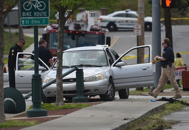 Chattanooga police work the scene were a man was shot on Alton Park Boulevard on Friday.