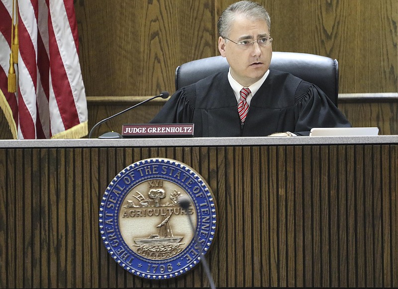 Staff file photo by Dan Henry / The Chattanooga Times Free Press - Judge Tom Greenholtz on the bench in August.