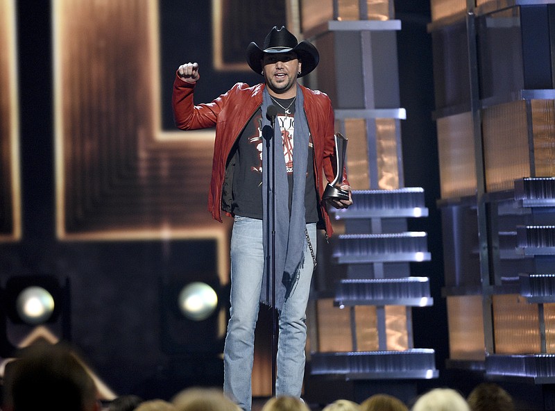 Jason Aldean accepts the award for entertainer of the year at the 52nd annual Academy of Country Music Awards at the T-Mobile Arena on Sunday, April 2, 2017, in Las Vegas. (Photo by Chris Pizzello/Invision/AP)