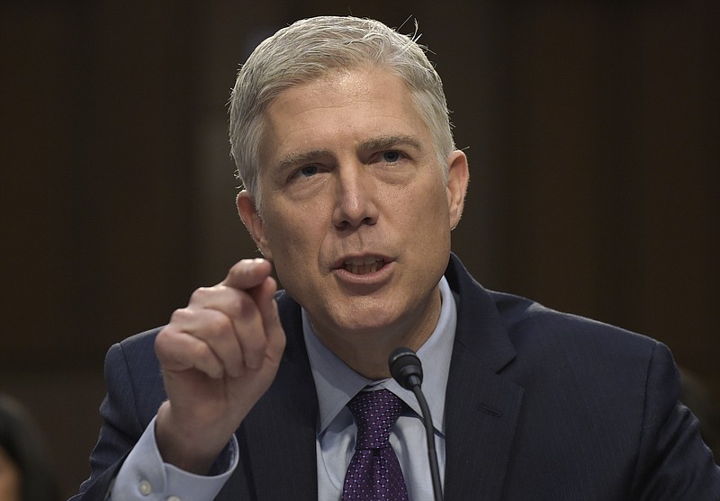 
              FILE - In this March 21, 2017 file photo, Supreme Court Justice nominee Neil Gorsuch testifies on Capitol Hill in Washington during his confirmation hearing before the Senate Judiciary Committee. A divided Senate Judiciary Committee backed Gorsuch, Monday, April 3, 2017. GOP likely to change Senate rules to confirm him. (AP Photo/Susan Walsh, File)
            