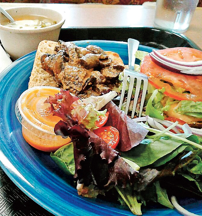 Plant Power serves a portobello mushroom burger plate with potato-vegetable soup and a fresh green salad.