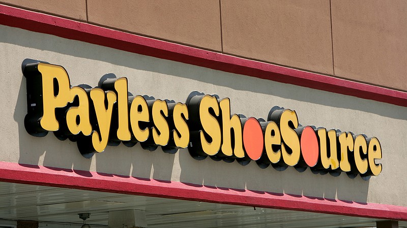 FILE- This Aug. 23, 2006, file photo shows a Payless store front in Philadelphia. (AP Photo/Matt Rourke, File)
            