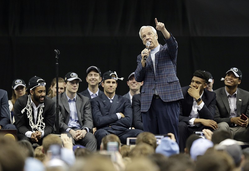 
              Coach Roy Williams addresses the crowd as North Carolina basketball players and coaches greet fans in Chapel Hill, N.C., Tuesday, April 4, 2017 following Monday's win over Gonzaga in the NCAA college basketball championship. (AP Photo/Gerry Broome)
            