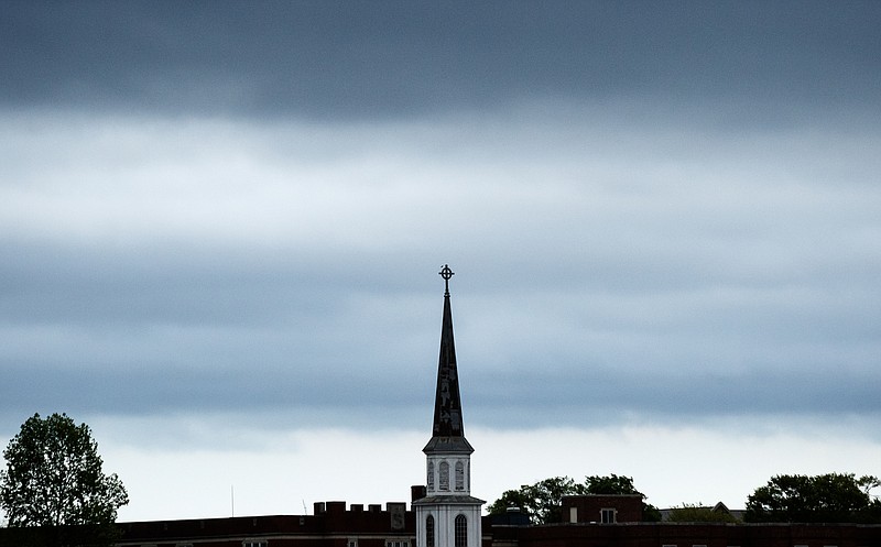 Clouds gather over the steeple of a church as severe thunderstorms approach Wednesday, April 5, 2017, in Chattanooga, Tenn.