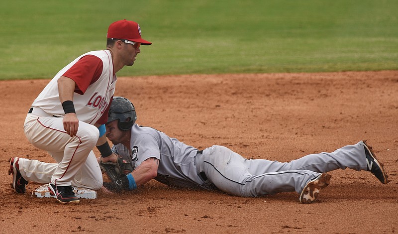 Chattanooga Lookouts second baseman Levi Michael tags the Jackson Generals' Brock Hebert during a game at AT&T Field last season. Michael, relief pitcher Nick Burdi and outfielder Travis Harrison begin their third season with the Lookouts tonight.