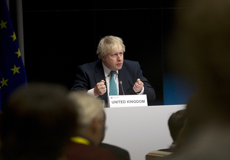 
              British Foreign Secretary Boris Johnson speaks during a media conference at an EU Syria conference at the Europa building in Brussels on Wednesday, April 5, 2017. The EU and other nations met Wednesday to discuss what will be needed to rebuild war-ravaged Syria. (AP Photo/Virginia Mayo)
            