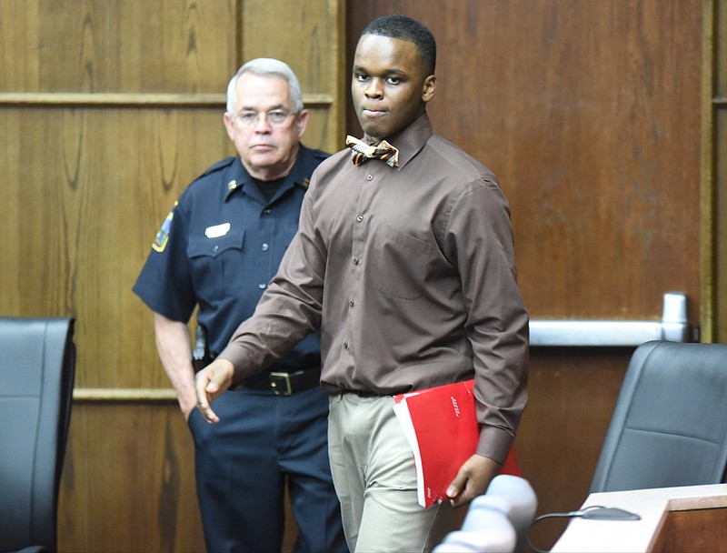 Cortez Sims walks into Judge Barry Steeleman's courtroom at the start of his trial on Tuesday.
