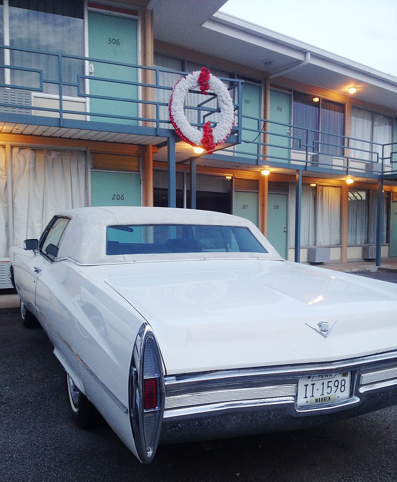 A vintage Cadillac is parked below Room 306 of the Lorraine Motel, in Memphis, where Dr. Martin Luther King Jr. was assassinated on April 4, 1968. .