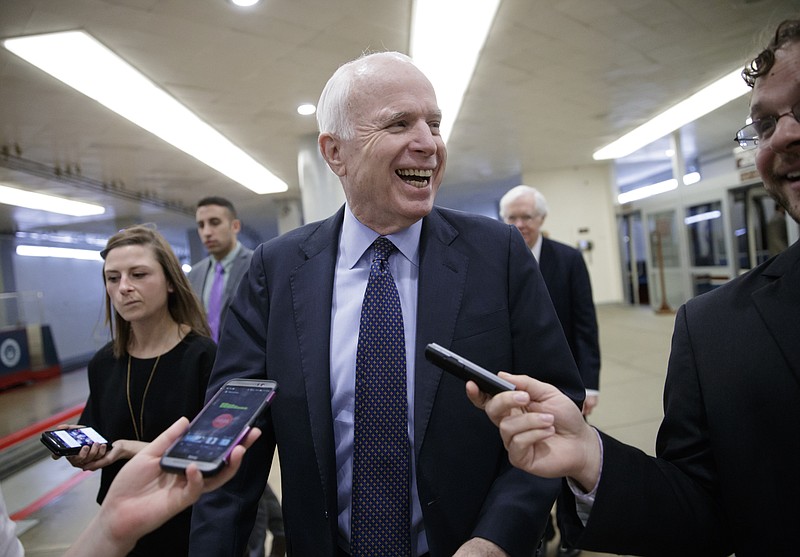 
              Sen. John McCain, R-Ariz. is pursued by reporters as he arrives for the scheduled cloture vote to end debate on President Donald Trump's Supreme Court nominee Neil Gorsuch, on Capitol Hill in Washington, Thursday, April 6, 2017, as the Republican majority is poised to change Senate rules and lower the vote threshold for Supreme Court nominees from 60 votes to a simple majority. McCain feels that move will diminish the bipartisanship and said "I fear that someday we will regret what we are about to do." (AP Photo/J. Scott Applewhite)
            