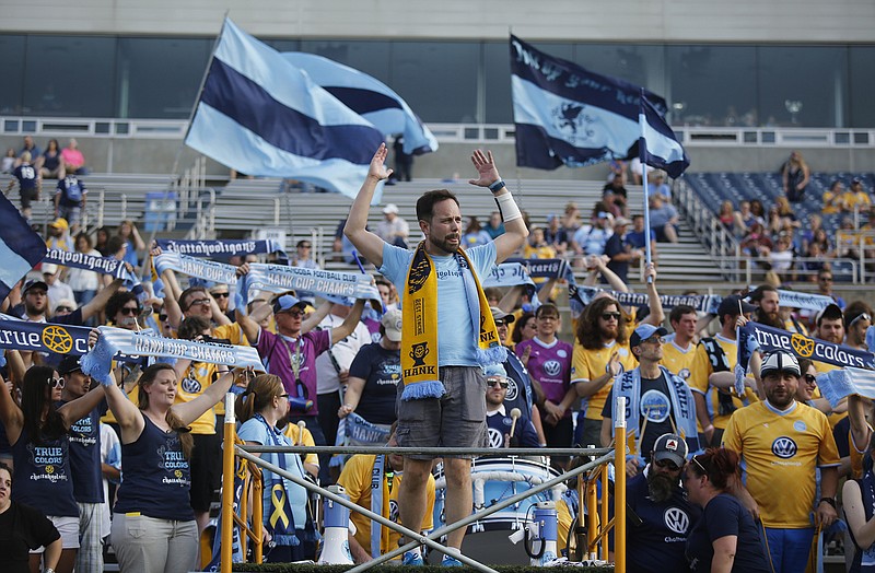 Galen Riley leads the Chattahooligans in a chant during a Chattanooga FC match last spring at Finley Stadium. The venue has also hosted matches for the U.S. men's and women's soccer teams over the past two years, and it's the home for UTC football.