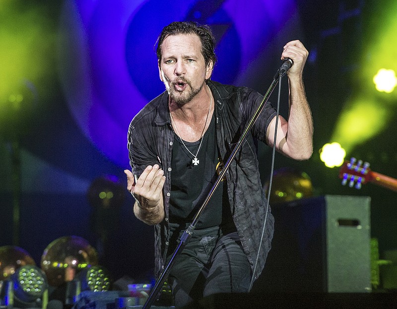 
              FILE - In this June 11, 2016 file photo, Eddie Vedder of Pearl Jam performs at Bonnaroo Music and Arts Festival in Manchester, Tenn. Pearl Jam, Tupac Shakur, Joan Baez, Electric Light Orchestra, Journey and Yes will be inducted into the Rock and Roll Hall of Fame on Friday, April 7, 2017. (Photo by Amy Harris/Invision/AP, File)
            