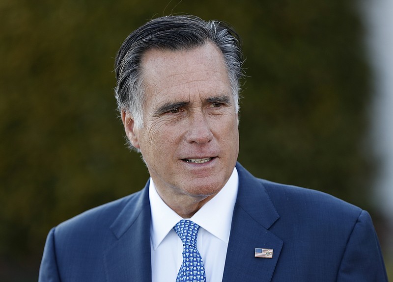 
              In this photo taken Nov. 19, 2016, Mitt Romney talks to media after meeting with President-elect Donald Trump at Trump National Golf Club Bedminster in Bedminster, N.J. Senate Majority Leader Mitch McConnell says he has reached out to former Republican presidential candidate Mitt Romney about possibly running for the Senate, if a vacancy opens in Utah.(AP Photo/Carolyn Kaster)
            