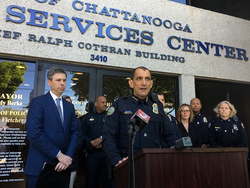 Mayor Andy Berke, far left, looks on as Chattanooga Police Department Chief Fred Fletcher announces he's leaving the force at the end of his contract this summer. 