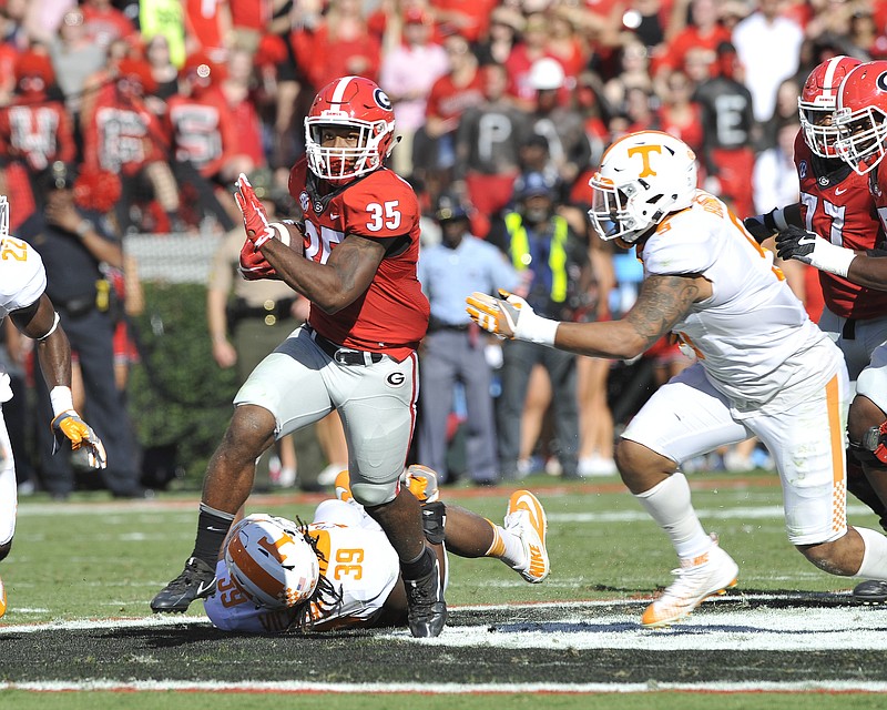 Georgia photoGeorgia tailback Brian Herrien, shown here as a freshman last year against Tennessee, was singled out Saturday by coach Kirby Smart for a solid showing in the first spring scrimmage.