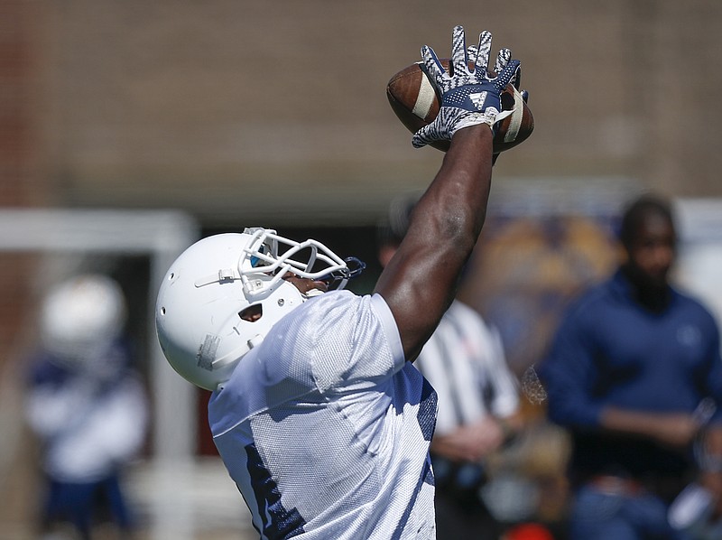 UTC fullback Torrez Finney catches a pass during UTC's spring football game day at Finley Stadium on Saturday, April 8, 2017, in Chattanooga, Tenn. This year's spring game was an open practice followed by a 40 minute scrimmage.