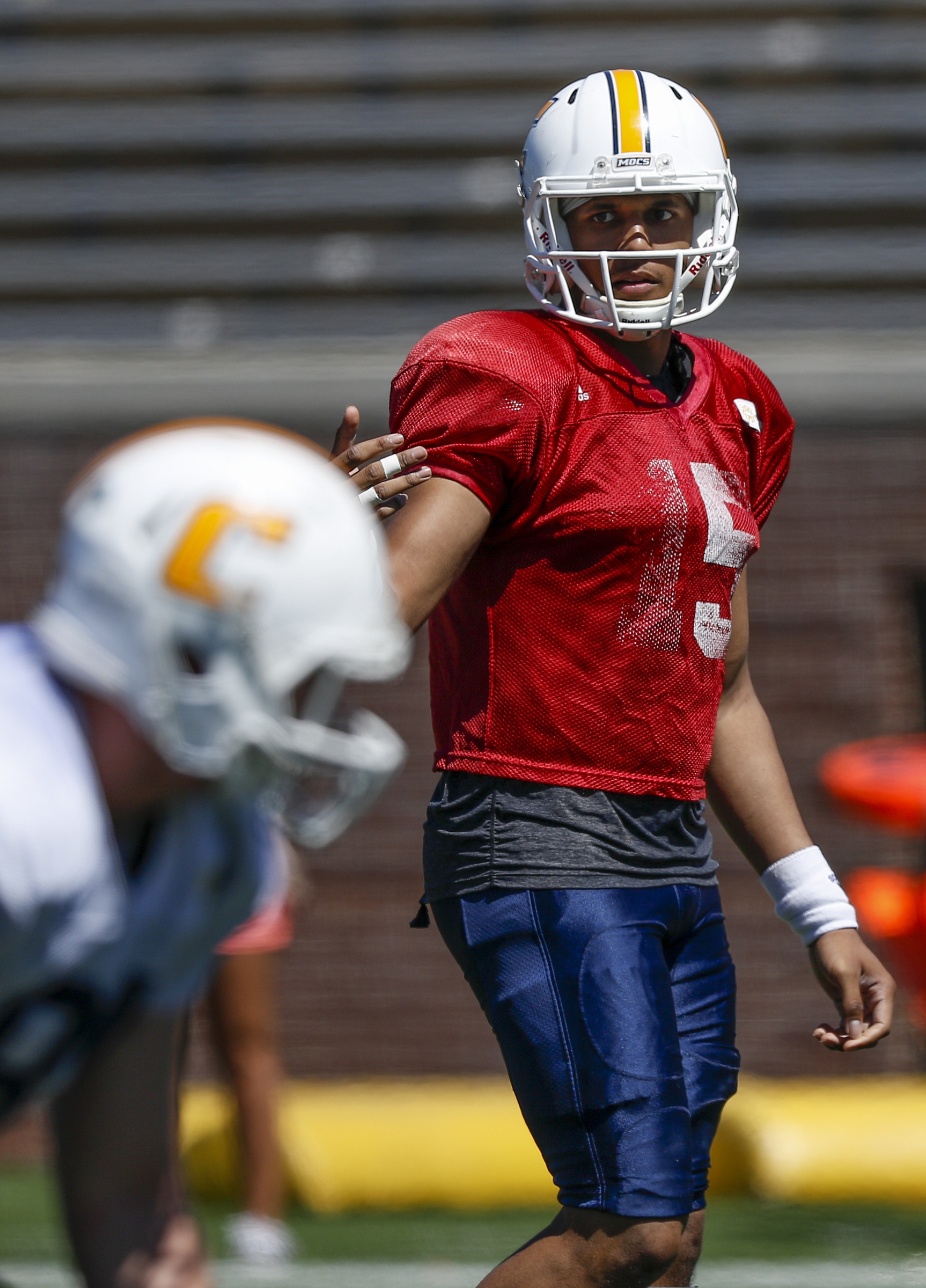 UTC quarterback Alejandro Bennifield directs his offensive line during UTC's spring football game day at Finley Stadium on Saturday, April 8, 2017, in Chattanooga, Tenn. This year's spring game was an open practice followed by a 40 minute scrimmage.