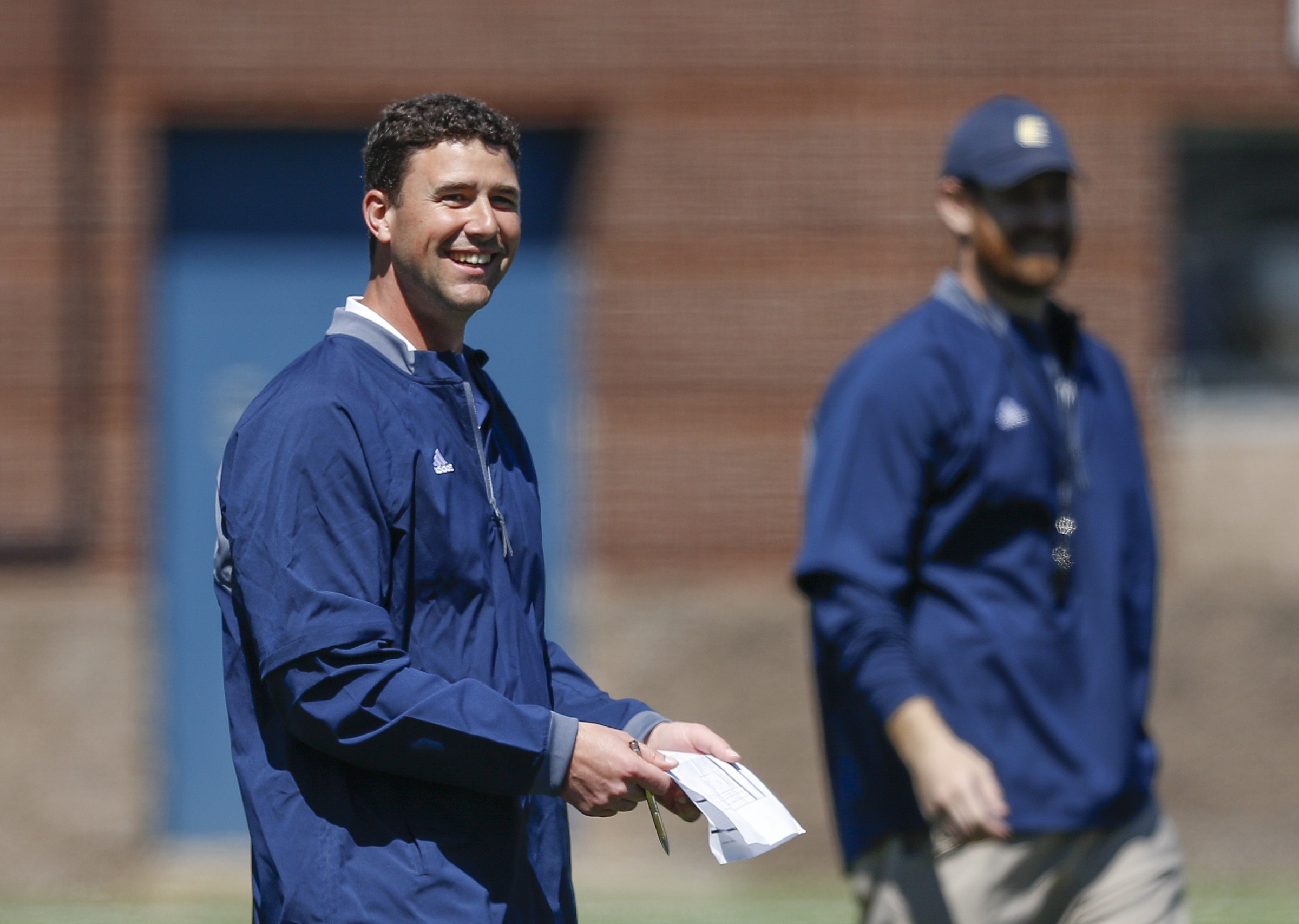 UTC head football coach Tom Arth directs players during UTC's spring football game day at Finley Stadium on Saturday, April 8, 2017, in Chattanooga, Tenn. This year's spring game was an open practice followed by a 40 minute scrimmage.