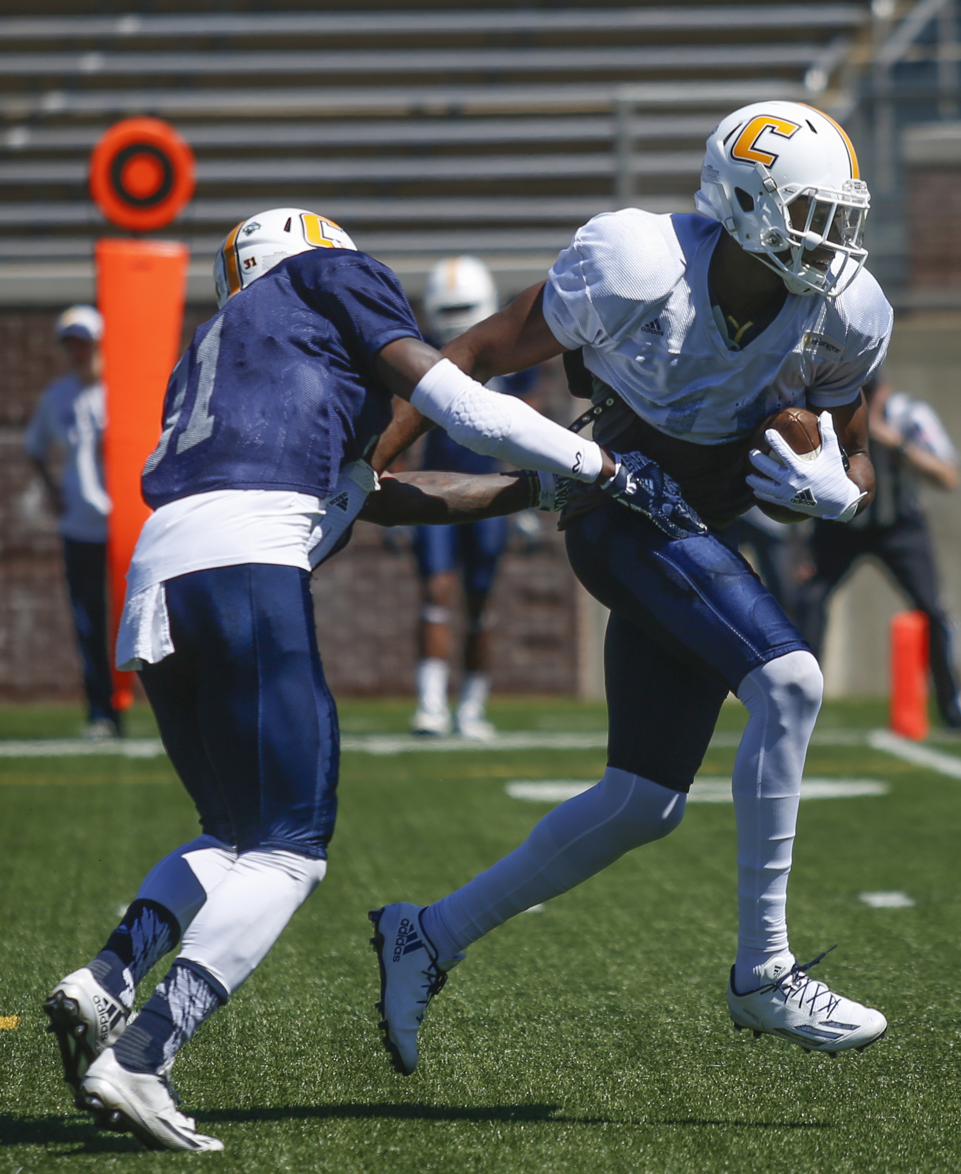 UTC wide receiver Wil Young breaks around defensive back K.J. Roper during UTC's spring football game day at Finley Stadium on Saturday, April 8, 2017, in Chattanooga, Tenn. This year's spring game was an open practice followed by a 40 minute scrimmage.