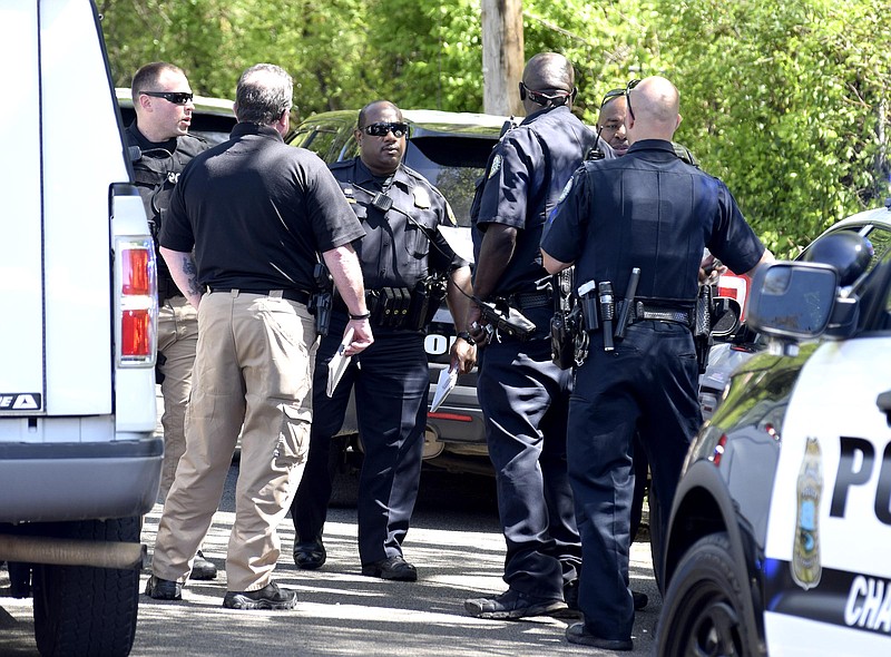 Staff Photo by Robin Rudd
Chattanooga Police Officers investigate a accidental shooting at 2516 East 21st Street on April 9, 2017. A 13-year old boy was reportedly wounded and transported to Erlanger Hospital.