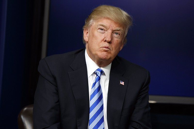 
              FILE - In this April 4, 2017, file photo, President Donald Trump listens to a question during a town hall with business leaders in the South Court Auditorium on the White House complex in Washington. The Trump administration will move forward with the sale of high-tech aircraft to Nigeria for its campaign against Boko Haram Islamic extremists despite concerns over abuses committed by the African nation’s security forces, according to U.S. officials. (AP Photo/Evan Vucci, File)
            