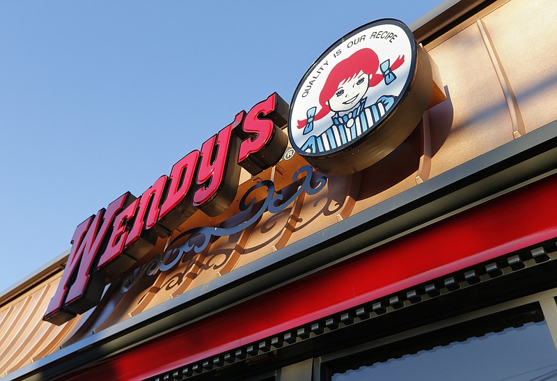 
              FILE - This Friday, March 21, 2014, file photo, shows a Wendy's restaurant in Providence, R.I. A Nevada teen's joke Twitter campaign to win a year of free chicken nuggets from Wendy’s may become the platform’s most retweeted post of all time. Carter Wilkinson launched the effort on April 5, 2017. (AP Photo/Michael Dwyer, File)
            