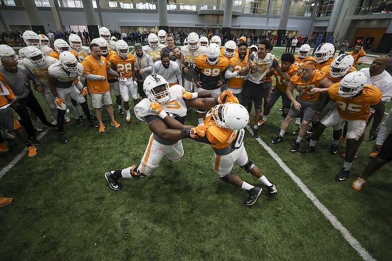 KNOXVILLE, TN - APRIL 06, 2017 - offensive lineman Trey Smith #73 of the Tennessee Volunteers and defensive lineman Paul Bain #97 of the Tennessee Volunteers during Spring practice on the Indoor Field in Knoxville, TN. Photo By Donald Page/Tennessee Athletics