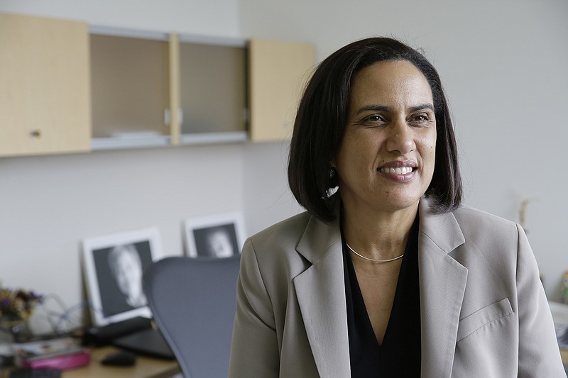 
              In this photo taken Friday, April 7, 2017, Dr. Kirsten Bibbins-Domingo poses in her office in San Francisco. Draft recommendations from the US Preventive Services Task Force ditch the old advice against PSA screening and say whether to get tested should be left up to men aged 55 to 69 after being informed of the potential benefits and harms. The advice would bring the influential panel more in line with other major doctor groups. (AP Photo/Eric Risberg)
            