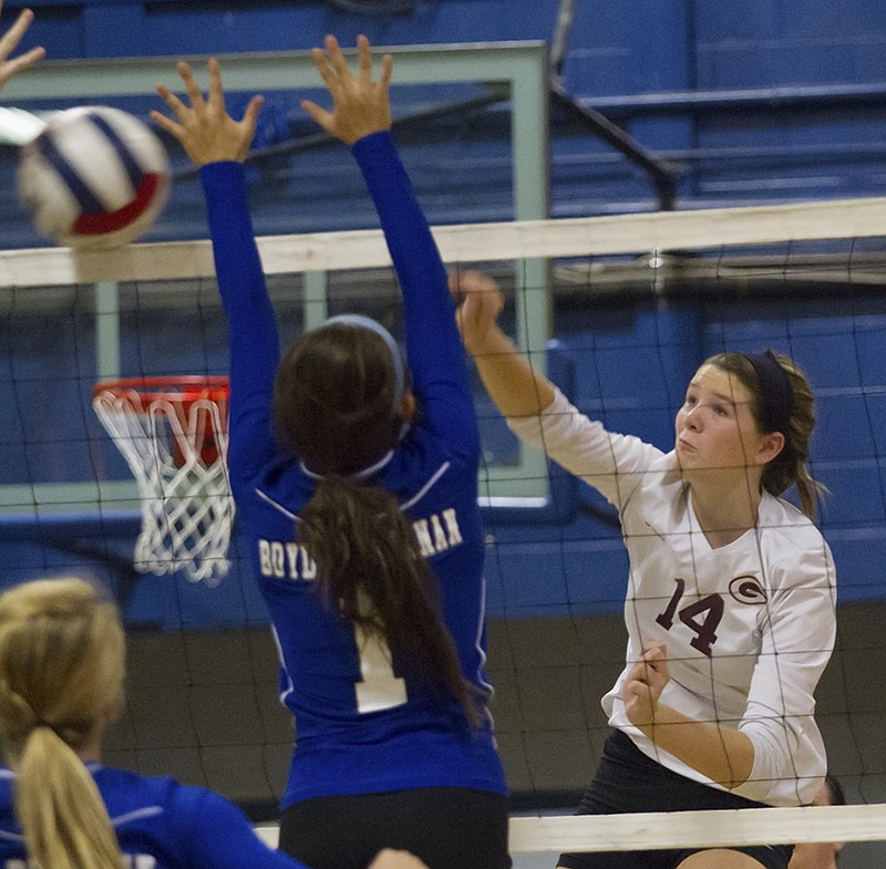 Grace Academy volleyball player Alex Smith, right, has signed with Samford.