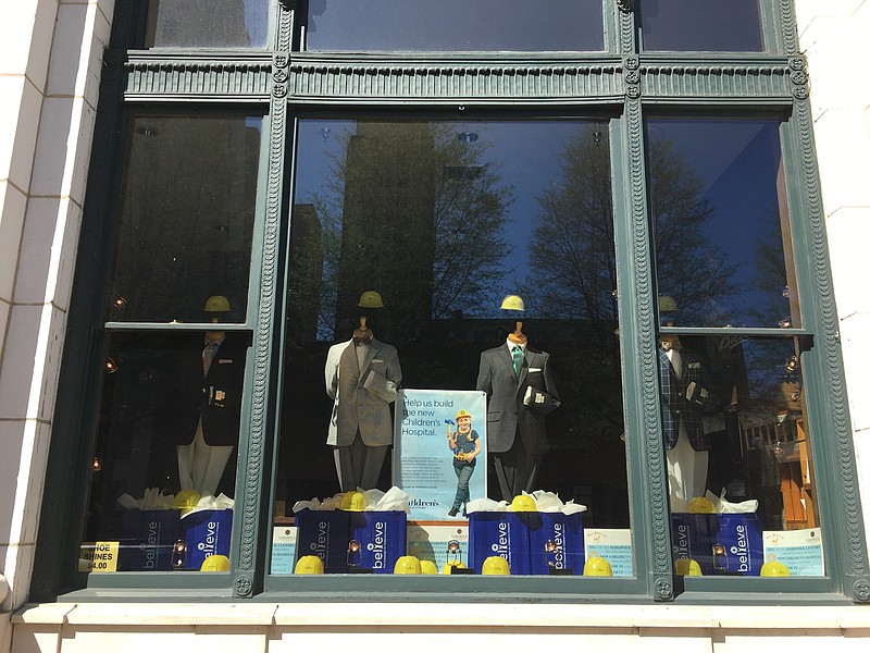 Bruce Baird & Co. clothing store decorated the front window to highlight the Children's Hospital at Erlanger's Believe Campaign.