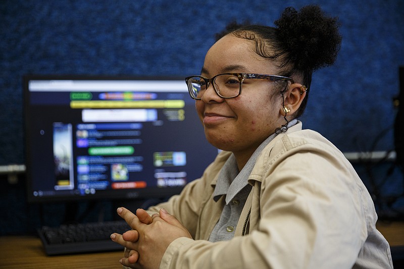 Camp College graduate Chyna Terrell sits in a computer class at Tyner Academy on Thursday, April 13, 2017, in Chattanooga, Tenn. The Public Education Foundation hosts students at Camp College every summer to increase college enrollment and graduation rates.