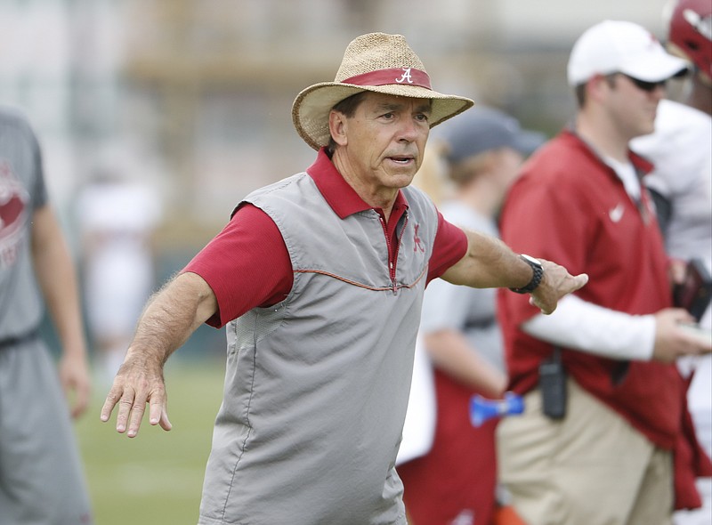 Alabama football coach Nick Saban is happy to have a 10th assistant, which will be allowed for FBS teams starting next year, but he is not as pleased about the elimination of two-a-day practices.