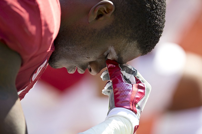 Alabama defensive back Deionte Thompson did not take part in Friday's scrimmage after being arrested.