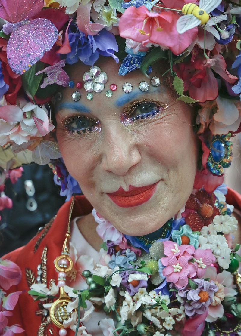 
              Patricia "Purely" Fox, of Manhattan, shows off her Easter bonnet that she said took 20 hours to make at the annual Easter Parade and Bonnet Festival, Sunday, April 16, 2017, in New York. (AP Photo/Bebeto Matthews)
            