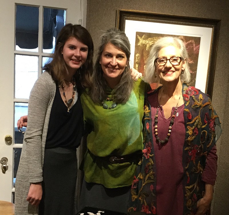 From left, Mary Kathryne Schumaker, Mary Lynn Portera and Diane Human attend one of Mary Portera's art showings. Mary Kathryne and Mary Lynn are Portera's daughters, and Human was one of River Gallery's first regular customers in the 1990s. (Contributed photo)