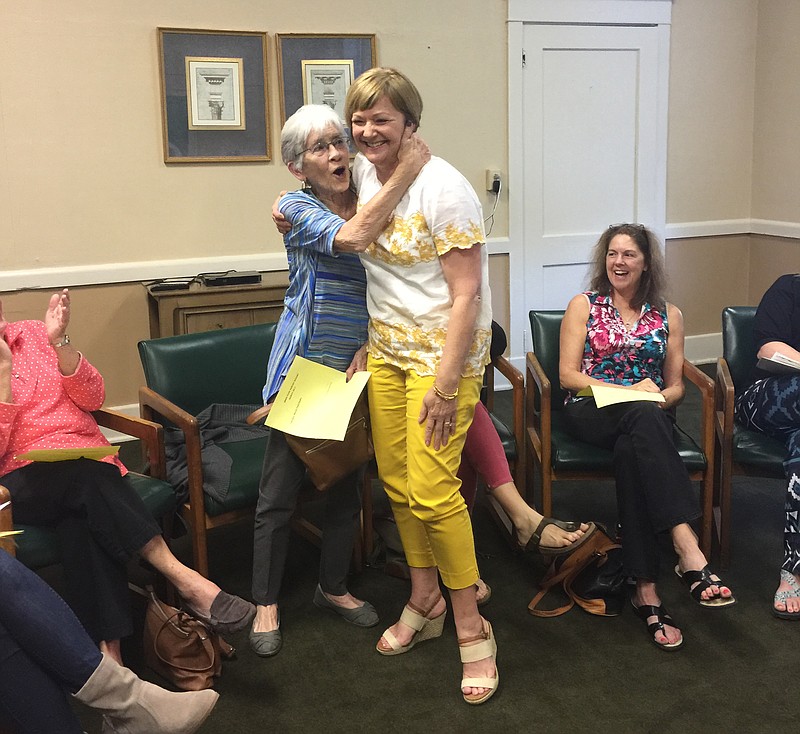 Signal Mountain Social Services Executice Director Mary Lee Ziebold, right, announces Shirley Keyes as the organization's 2017 Volunteer of the Year. (Contributed photo)