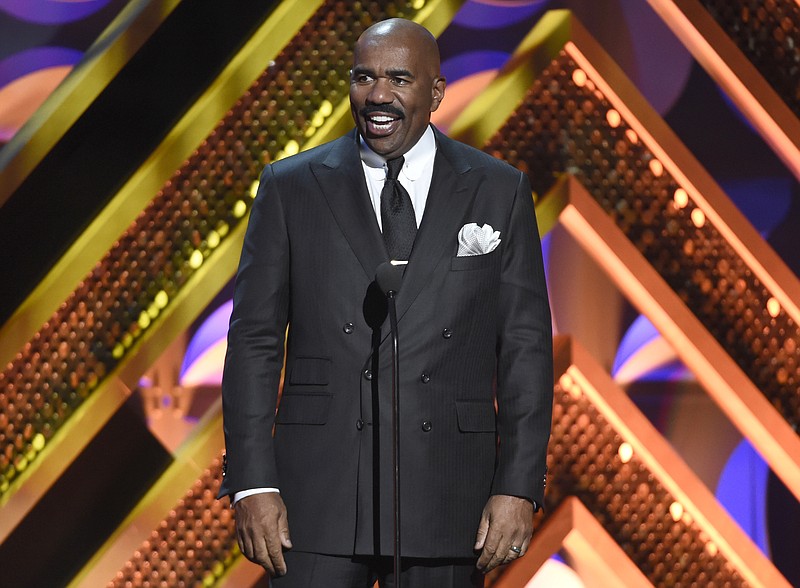 
              FILE - In this April 26, 2015 file photo, Steve Harvey presents an award at the 42nd annual Daytime Emmy Awards in Burbank, Calif. The Fox network says it has picked up “Showtime at the Apollo” as a one-hour weekly series set to debut next season. Harvey will serve as host. (Photo by Chris Pizzello/Invision/AP, File)
            