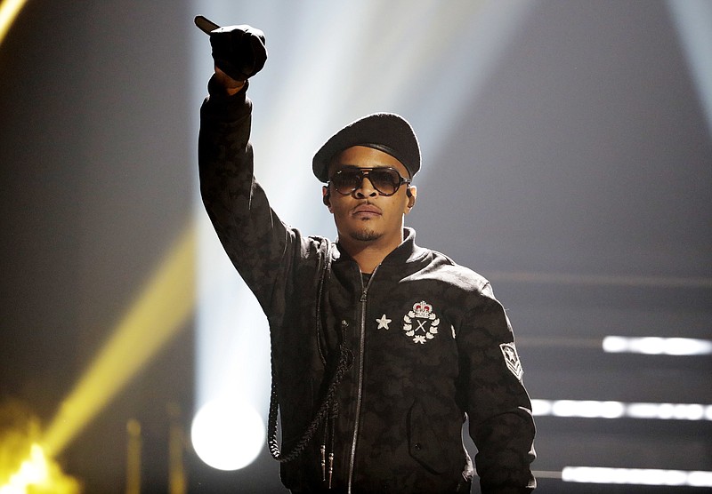 
              FILE - In this Sept. 17, 2016 file photo, T.I. performs during the BET Hip Hop Awards in Atlanta. Rapper T.I. has no plans to ever run for public office, but he said he wants to make a difference in underserved communities through activism and music. He has been active in the community, focusing on youth programs for boys and girls, and feels his role continues to grow when it comes to providing help to those that need it most. (AP Photo/David Goldman, File)
            