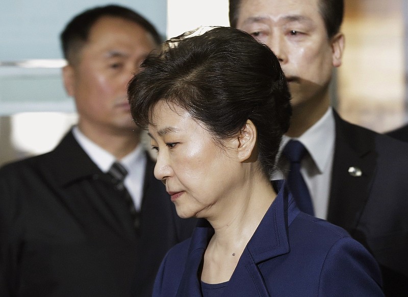 
              FILE - In this March 30, 2017 file photo, former South Korean President Park Geun-hye arrives at the Seoul Central District Court for hearing on a prosecutors' request for her arrest for corruption, in Seoul, South Korea. South Korean prosecutors on Monday, April 17 indicted Park on high-profile corruption charges that could potentially send her to jail for life. (AP Photo/Ahn Young-joon, Pool, File)
            