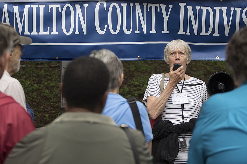 Mary Headrick speaks during a Truth to Power Rally hosted by Indivisible Chattanooga at Miller Park on Tuesday, April 18, 2017. The rally is in support of our environment and the EPA, healthcare for all, fair and humane immigration policies, and an independent investigation of Russian sabotage of the United States' 2016 elections.