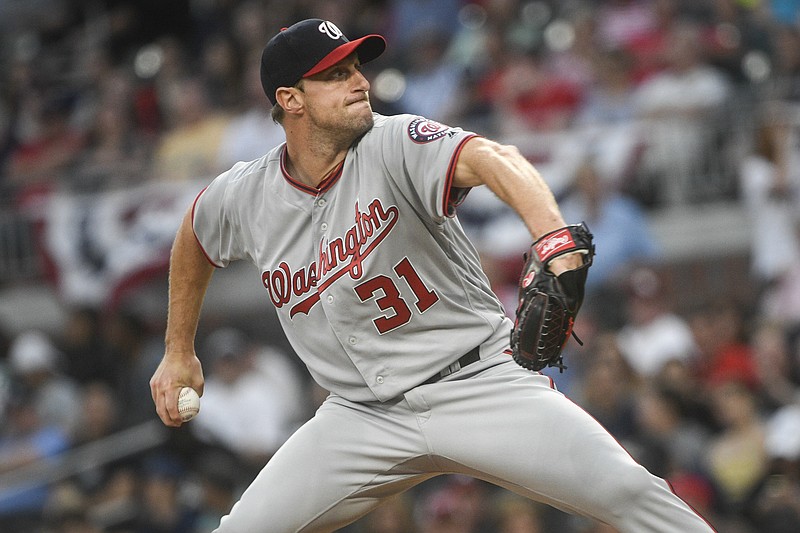 Washington Nationals' Max Scherzer pitches against the Atlanta Braves during the first inning of a baseball game, Tuesday, April 18, 2017, in Atlanta. (AP Photo/John Amis)