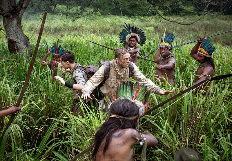This image released by Amazon Studios/Bleecker Street Films shows Tom Holland, center left, and Charlie Hunnam, center left, in a scene from "The Lost City of Z." (Aidan Monaghan/Amazon Studios/Bleecker Street via AP)