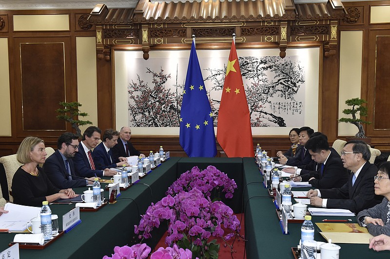
              High Representative of the European Union for Foreign Affairs and Security Policy Federica Mogherini, left, and China's State Councilor Yang Jiechi, second right, attend a meeting at Diaoyutai State Guesthouse, Wednesday, April 17, 2017, in Beijing. (Kenzaburo Fukuhara/Pool Photo via AP)
            