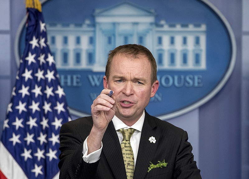 
              FILE - In this March 16, 2017, file photo, White House budget director Mick Mulvaney speaks at the White House, in Washington. Mulvaney says that Democratic negotiators on a massive spending bill need to agree to funding top priorities of President Donald Trump, such as a down payment on a border wall and hiring of additional immigration agents. Mulvaney told The Associated Press on April 20, that “elections have consequences” and that “we want wall funding” as part of the catchall spending bill, which lawmakers hope to unveil next week. (AP Photo/Andrew Harnik, file)
            