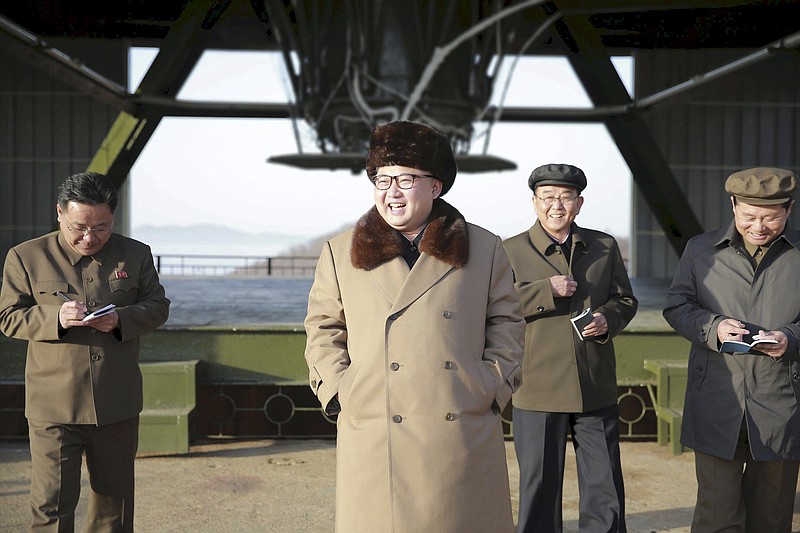 In a photo released by the North Korean government last April, Kim Jong-un visits a missile test center in North Pyongan Province.