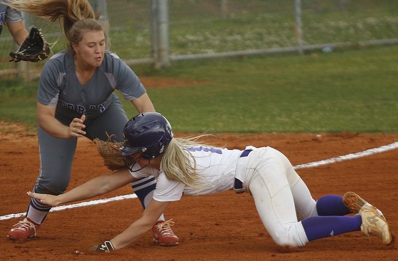 Red Bank 3rd baseman Sami Shrader tags out Central runner Brooke Parrott at 3rd after Parrot was run down between the bases during their prep softball game at Central High School on Thursday, April 20, 2017, in Chattanooga, Tenn.