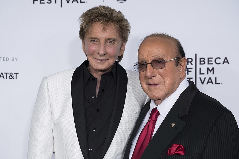 
              Barry Manilow, left, and Clive Davis attend the world premiere of "Clive Davis: The Soundtrack of Our Lives" at Radio City Music Hall, during the 2017 Tribeca Film Festival, Wednesday, April 19, 2017, in New York. (Photo by Charles Sykes/Invision/AP)
            